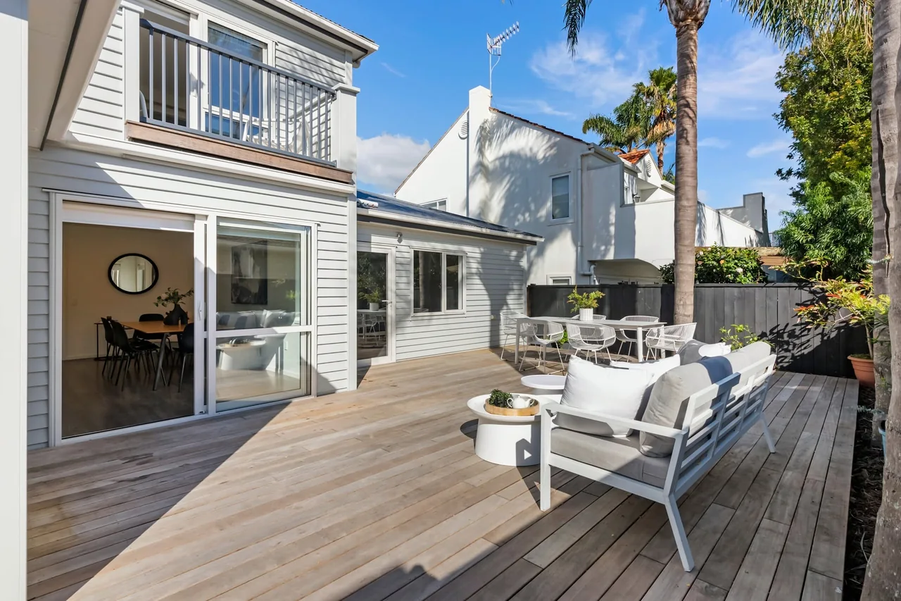 A finished outdoor living space by Key 2 Construction
